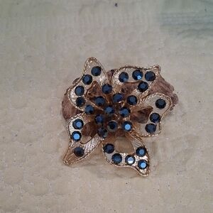 Sophisticated Gold and Black Floral Brooch